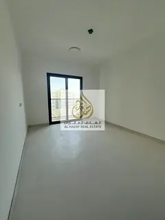 Brand new two bedroom apartment for rent in Sharjah Al Qulaya balcony free parking one month free fl