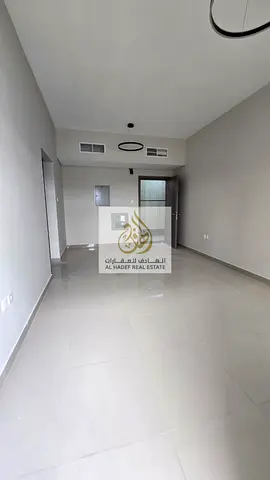 Al Jurf 3 on Mohammed Bin Zayed Road, near the Chinese Market - First occupancy, one bedroom, living room, two bathrooms with balcony - Excellent fini