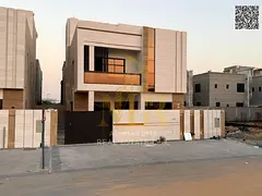 Two-story villa with a rooftop terrace in one of Ajman's most prestigious areas, on a main stree
