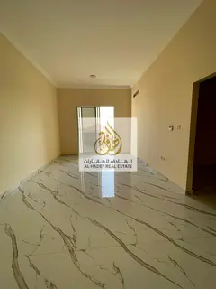 Annual rent in Ajman, Al Muwaihat 3 area, near Al Shuwaifat School and Ajman Academy. The building i