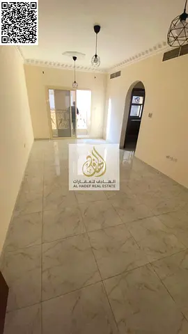 One bedroom and a large living room, two bathrooms, master bedroom with balcony, close to Al-Aqsa School and Al-Hammadi Restaurant.