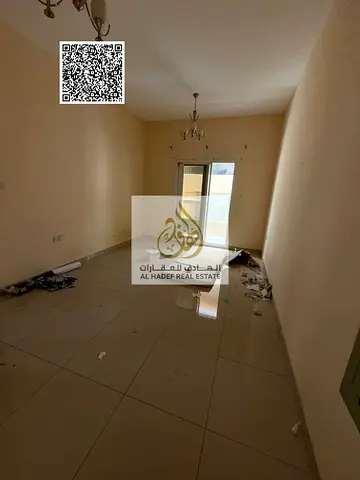 ONE-bedroom apartment with a living room, annual rent in Al Rawda 1