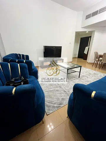 Monthly rent in Ajman Corniche, family building. One bedroom and living room, furnished with brand new furniture, first occupancy. 2 bathrooms, spacio