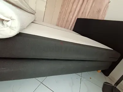 Grey fabric double bed base with headboard - good condition