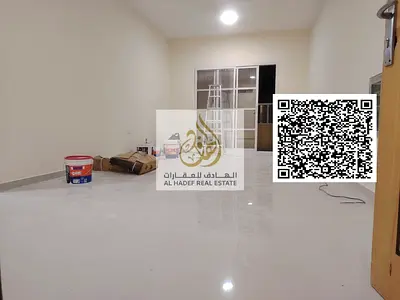 One bedroom and living room in Rawda 1, opposite Kenz Hypermarket and near Al Hamidiya Police Station. Includes a bathroom and balcony. Rent is 29,000