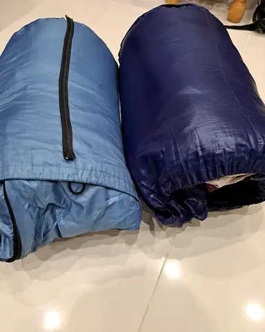 2 Sleeping Bags- Light Blue  Dark Blue