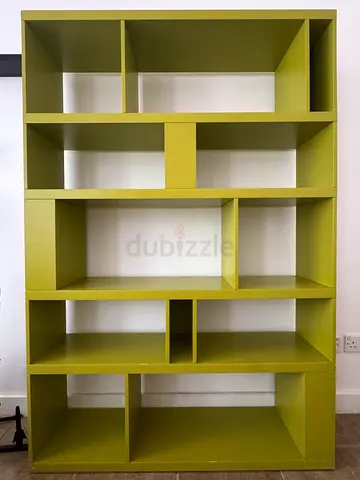 Large green modular bookcase / display shelving unit. Green lacquered.