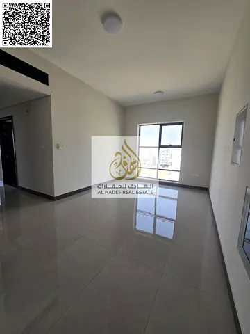 Two-bedroom apartment with a living room, three bathrooms, and a balcony. First occupancy. Largest space at the lowest price. Located on Sheikh Mohamm