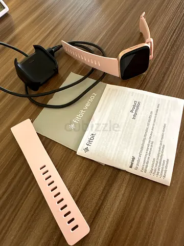 Light pink smartwatch with square screen (used) - good working condition