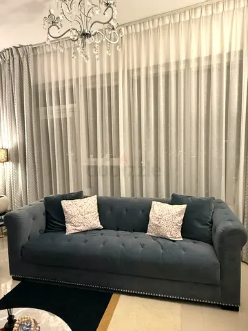 2XL brand .. Dark grey tufted 3-seater sofa with cushions