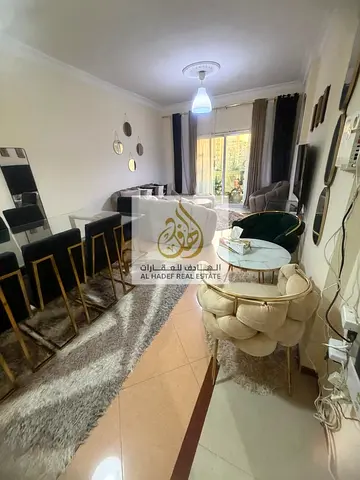 Monthly rent in Ajman, Al Nuaimiya 2, next to Safeer Mall and Istanbul Market. Two bedrooms and a living room, furnished with brand new furniture, fir