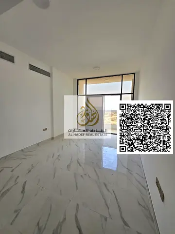 Annual rental apartment in Ajman Al Mowaihat 3 with 2 bedrooms, hall, 3 bathrooms, 2 master rooms near schools and Sheikh Mohammed Bin Zayed Road. Gre
