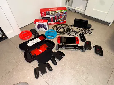 Nintendo Switch + Games  Accessories