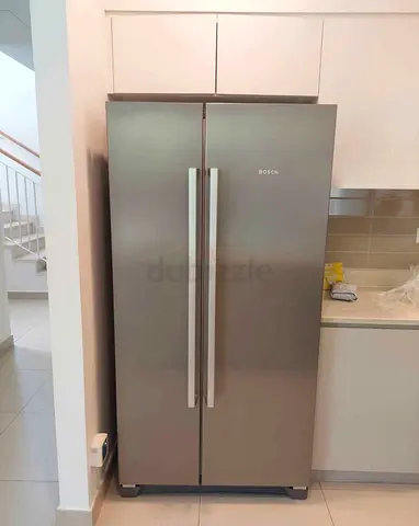 Bosch side by side refrigerator , neat and clean , same like a new , perfect working