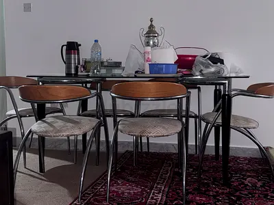 Glass Dining Table with 6 Modern Chairs — Good Condition