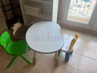 Kids activity table with three small chairs - used