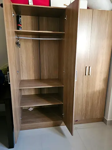 Ikea-style 2-door wooden wardrobe with shelves and hanging rail - good condition