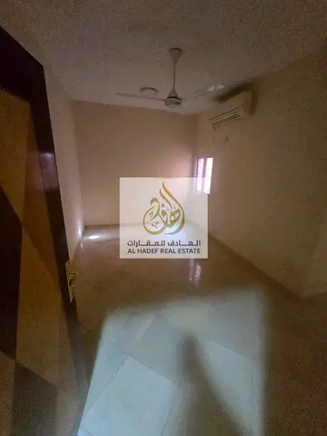 Annual rent in Ajman, Al Rawda 2, near Layali Beirut and Kenz Hypermarket. The building is for families. It features a bedroom, living room, separate