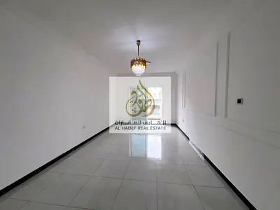 Al Muwaihat 3, near Sheikh Mohammed Bin Zayed Road and the Saudi German Hospital - Two bedrooms, living room, 2 bathrooms with balcony - Spacious, exc