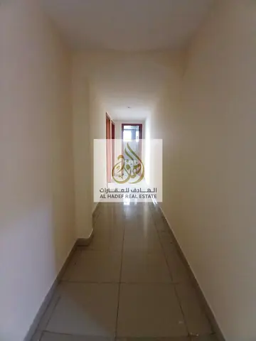 Two bedroom apartment for rent in Sharjah Al Qasimia Al Nad with free parking prime location near services and spacious layout