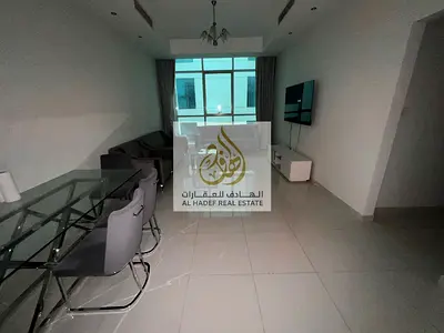 A unique opportunity to rent in Al Khan: a semi-furnished two-bedroom apartment with a living room, storage room, and master bedroom. Free parking and