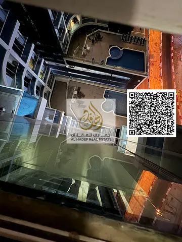 Luxury furnished studio in Al Rashidiya 1 for monthly rent, high-end furnishings and a large space with a gym, swimming pool and parking, prime locati
