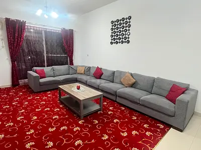 Large Grey L-shaped Sofa with Table and Curtains - Spacious 8-seater, good condition