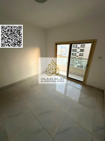 One bedroom, living room, two bathrooms, and a balcony. Large area. Located on King Faisal Street.