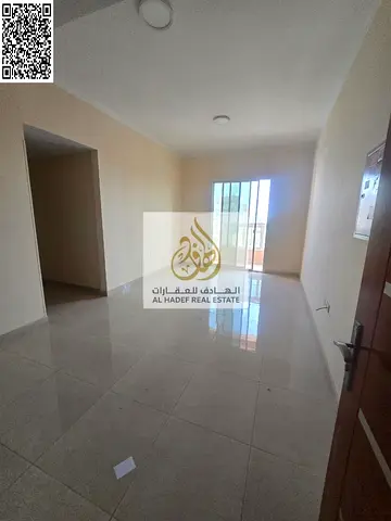 Two bedrooms, a living room, three bathrooms, a large master bedroom with a balcony in Al Rawda 1