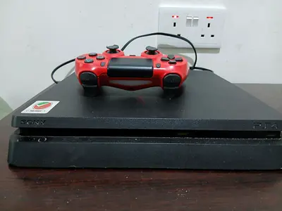 Sony PS4 Slim with Wired Controller - And 3 CDs (Minecraft, Fifa 23 and Call Of Duty Black Opps 4)