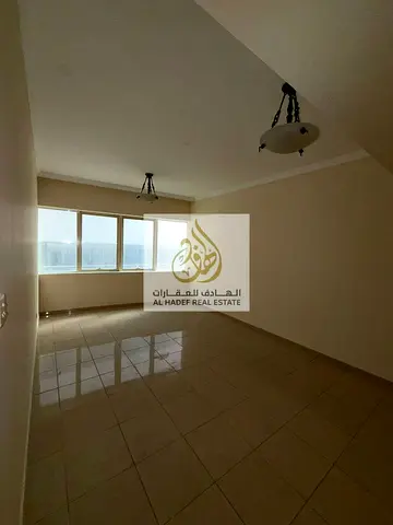 Two bedroom apartment for rent in Sharjah Al Taawun with maid room balcony and free month offer prime location near Dubai and services