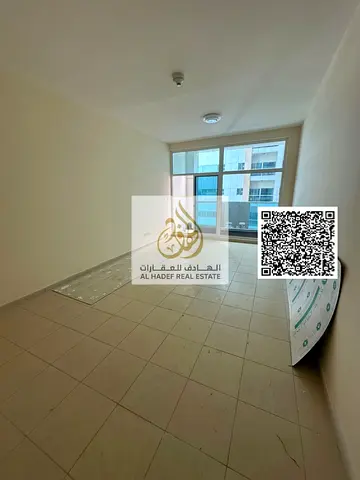 Two bedrooms and a living room for annual rent in Ajman One Towers, Al Rashidiya 3, Sheikh Khalifa Street. Features include: 3 bathrooms, master bedro