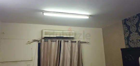 Used wall-mounted split air conditioner (installed, working) - 1.5 to 2.0 TON approx.