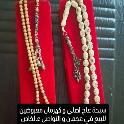 Genuine ivory rosary inlaid with silver, priced at 10,500