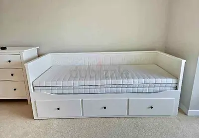 IKEA Hamnes Day bed with 3 storage drawers underneath and with 2 IKEA mattresses