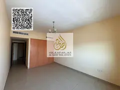 Two-bedroom apartment with a living room, free air conditioning, Al Rashidiya 3, Ajman