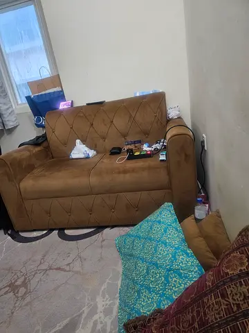 Used 2-Seater Brown Sofa - Good Condition