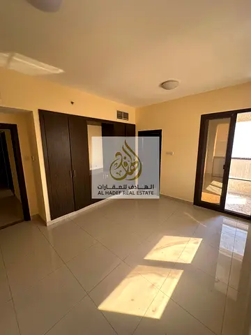 Two rooms and a living room with built-in wardrobes, annual rent in Al Nuaimiya 1