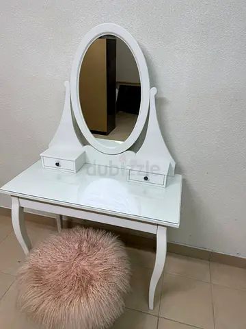 This is an IKEA HEMNES vanity with a white mirror.