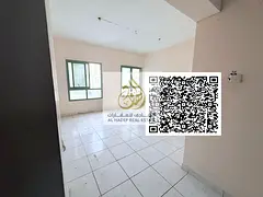 Two-bedroom apartment for rent in Al Nahda, Sharjah, with two bathrooms, built-in wardrobes, free ma