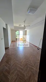 A spacious apartment available for annual rent in Al Mowaihat, located in a prime area close to Ajma