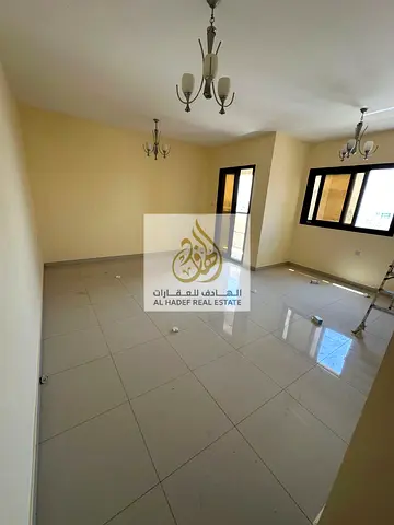 Two rooms and a hall for annual rent with built-in wardrobes in Al Naimiyah