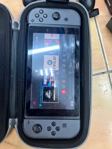 Nintendo Switch console with carrying case - used, working
