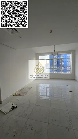 Two bedrooms, a large living room, two balconies, and two bathrooms in Al Rashidiya 3