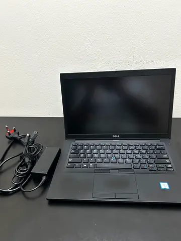 Dell Latitude laptop with charger - good working condition