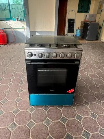 Used Midea Freestanding Gas Cooker with Oven - 4 Burners good working condition