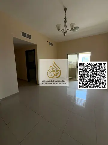 Two bedrooms and a living room in Al Hamidiya, opposite Ajman Court. Two bathrooms, balcony with an open view, built-in wardrobes, and parking. Rent i