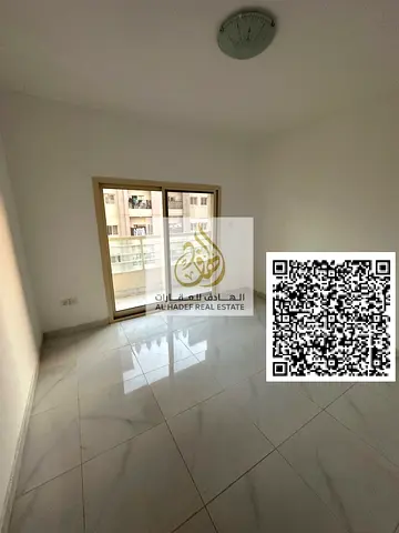 One-bedroom apartment for annual rent in Al Nuaimiya, King Faisal Street. Includes a master bedroom, two bathrooms, a balcony, central air conditionin