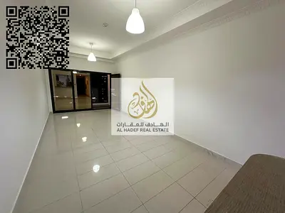 One bedroom and living room for annual rent in Al Rashidiya 1, Ajman, with parking, gym, swimming pool, aqua park, and electrical appliances.