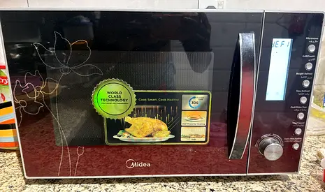 Midea Convection Microwave Oven - Good Working Condition vegetarian usage only -aed 250 - 0529752069